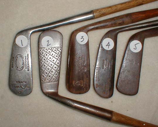 old wooden golf clubs