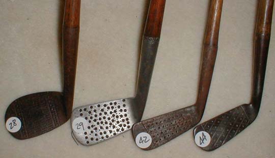 Gifts for the Golfer! Golf Gifts. Wooden Shaft Golf Clubs and Collectibles, Antique Golf Balls and golf collectables.  Hickory Golf Clubs - Great artifacts for interior decorating! Rare coins on ebay.  Gofl clubs.