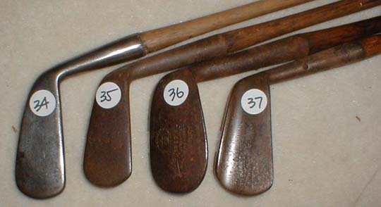 Gifts for the Golfer! Golf Gifts. Wooden Shaft Golf Clubs and Collectibles, Antique Golf Balls and golf collectables.  Hickory Golf Clubs - Great artifacts for interior decorating! Rare coins on ebay.  Gofl clubs.