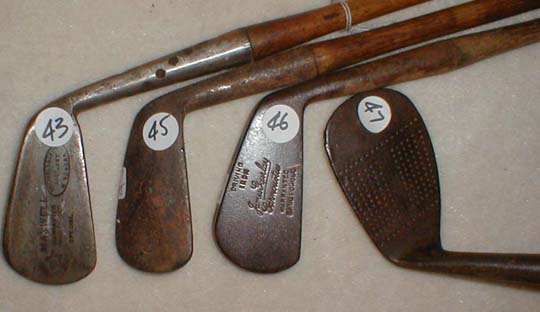 Gifts for the Golfer! Golf Gifts. Wooden Shaft Golf Clubs and Collectibles, Antique Golf Balls and golf collectables.  Hickory Golf Clubs - Great artifacts for interior decorating! Rare coins on ebay.  Gofl clubs.
